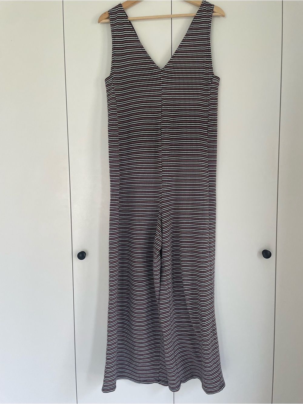 Striped Sleeveless V-Neck Jumpsuit in Black and White